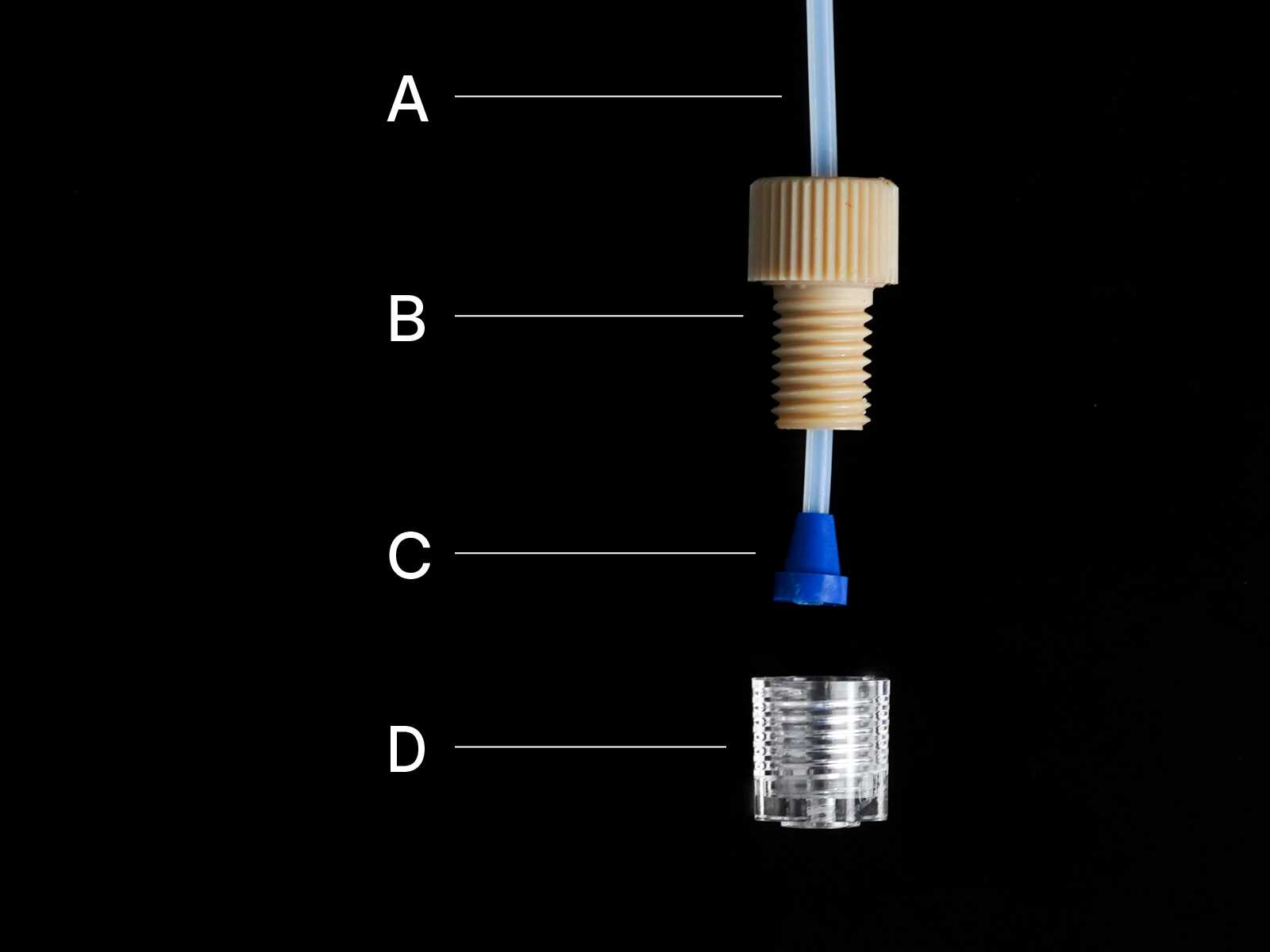 A flangeless 1/4-28 capillary tube interface, disassembled.