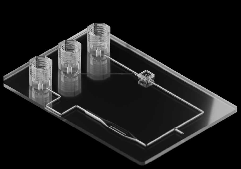The fabricated custom fluidic device that looks like the original upload.